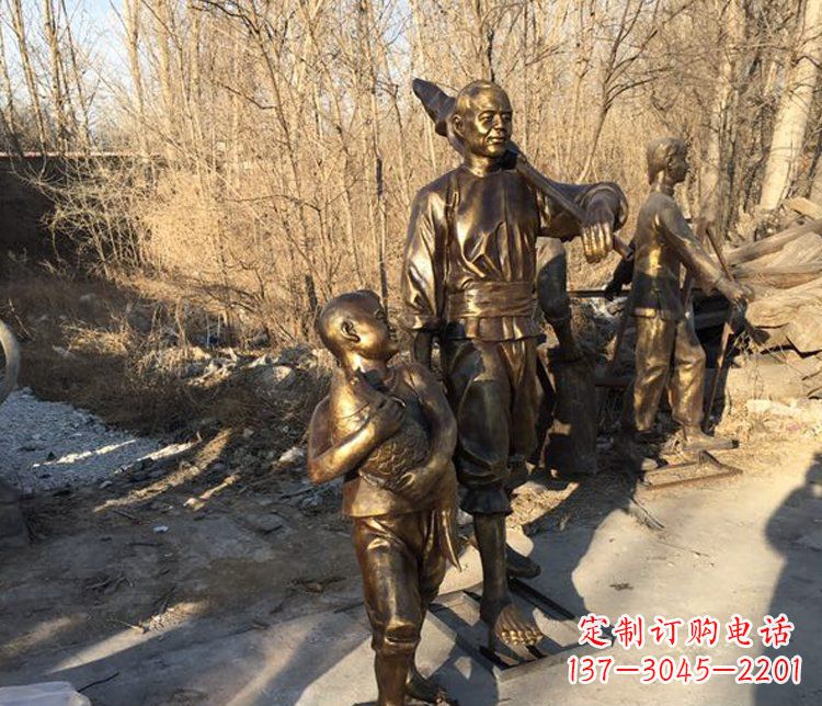 宁波抱着鱼的儿童街边小品铜雕