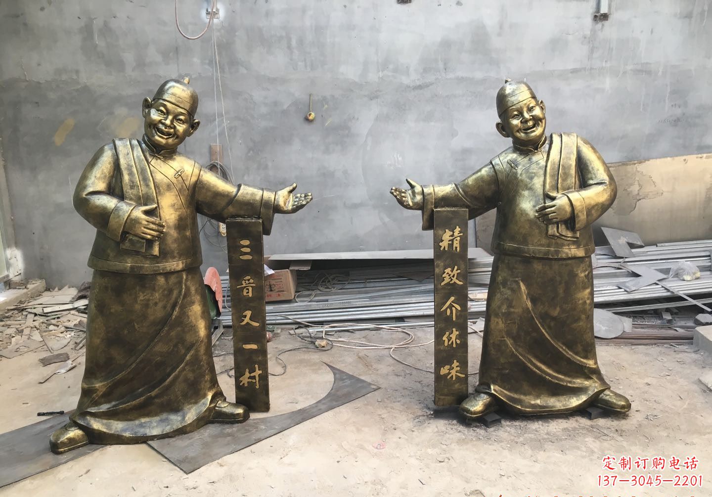 宁波中领雕塑:酒店门口店小二人物铜雕