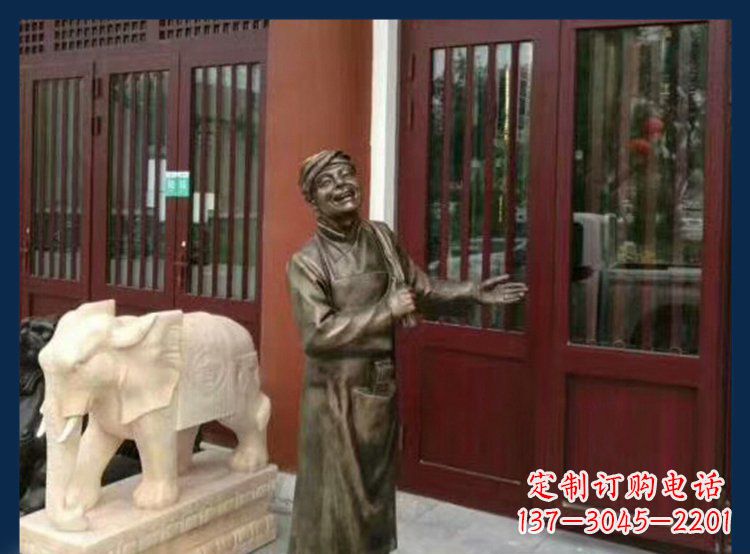 宁波铜雕店小二酒店迎宾人物雕塑