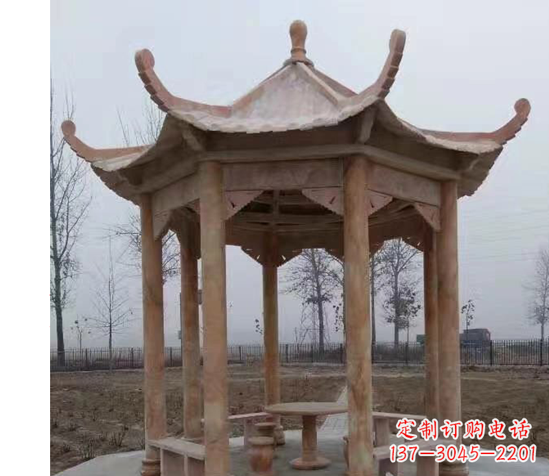 宁波公园晚霞红八角石雕凉亭